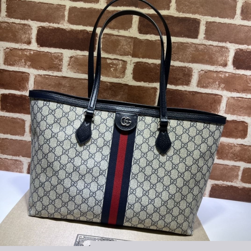 G*u*i shopping bags